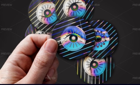 دانلود موکاپ استیکر هولوگرافیک در دست Holographic Sticker